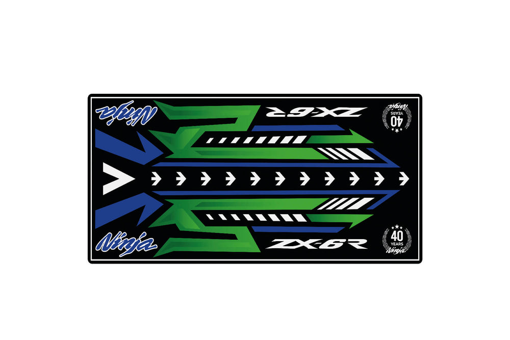 Graphic design on the Motorcycle Pit Mat features a vibrant blue, green, and black arrow and stripe pattern. Ninja and ZX-6R text adorns both sides with corner logos marking 40 years of performance, perfect for enhancing your motorcycle garage.