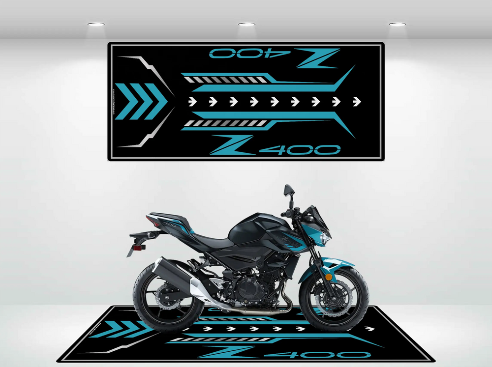 Blue and black custom motorcycle mat designed for Kawasaki Z400, displayed with a matching black and blue Z400 bike in a garage or showroom setting.